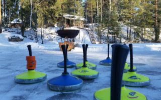 Hotelli Korpilampi talvi aktiviteetti alppi curling jääkolkka